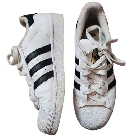 Adidas white low top superstars with black Adidas three stripes 5.5 men 7.5 women